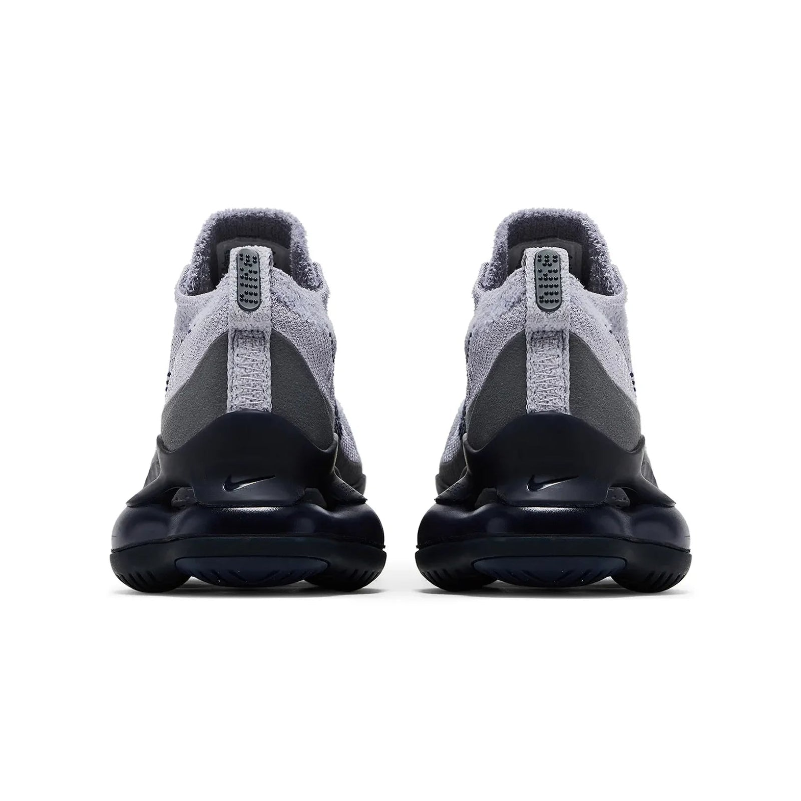 Gray and black athletic shoes on a white background