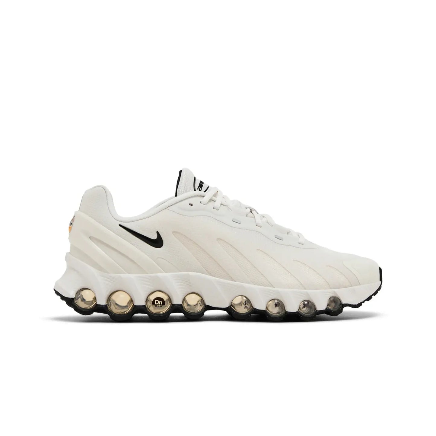 White sneaker with gold accents on a white background