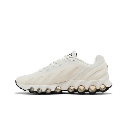 White sneaker with unique sole design on a white background