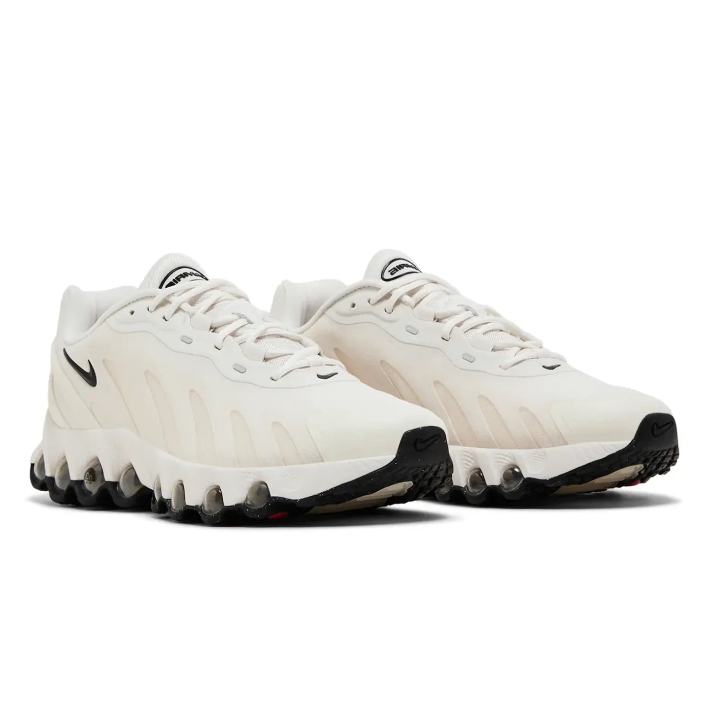 White athletic shoes with black accents on a white background