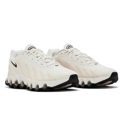 White athletic shoes with black accents on a white background