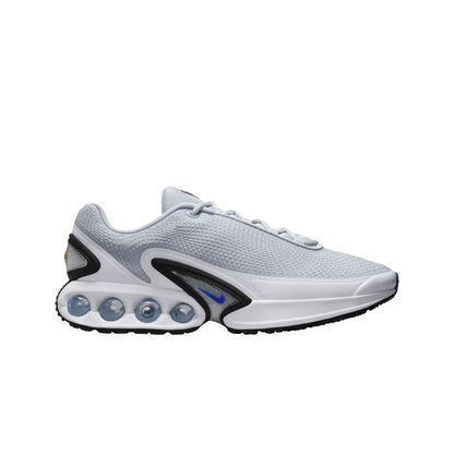 White athletic shoe with unique sole design on a white background
