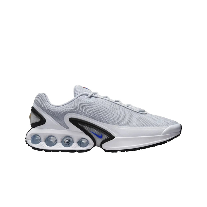 White athletic shoe with unique sole design on a white background