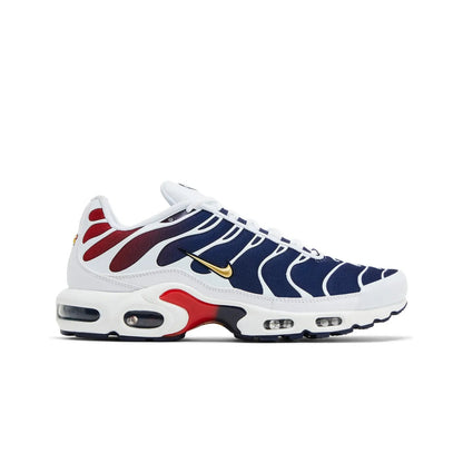 Multicolored sneaker with white sole on a white background