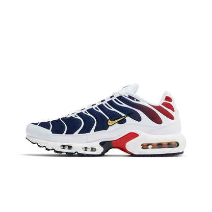 White sneaker with blue and red accents on a white background