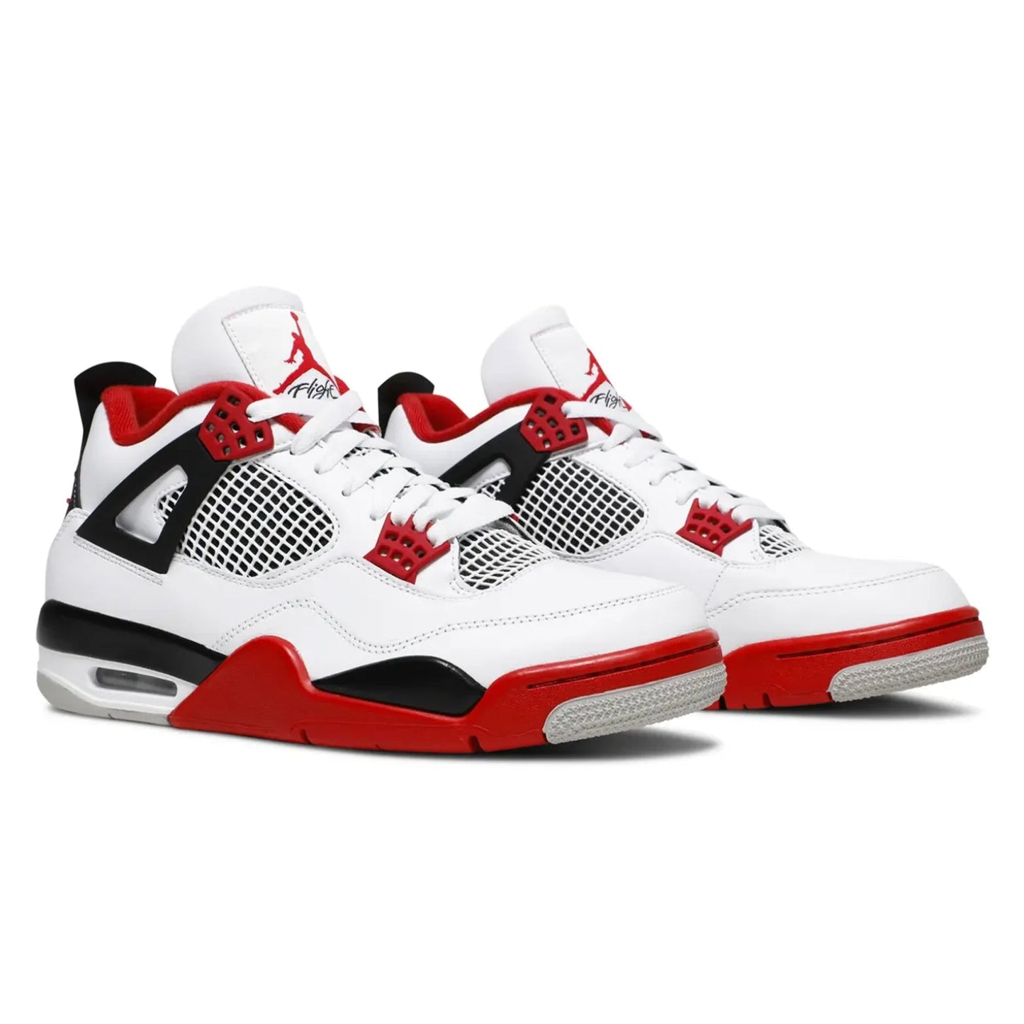 White sneakers with red and black accents on a white background