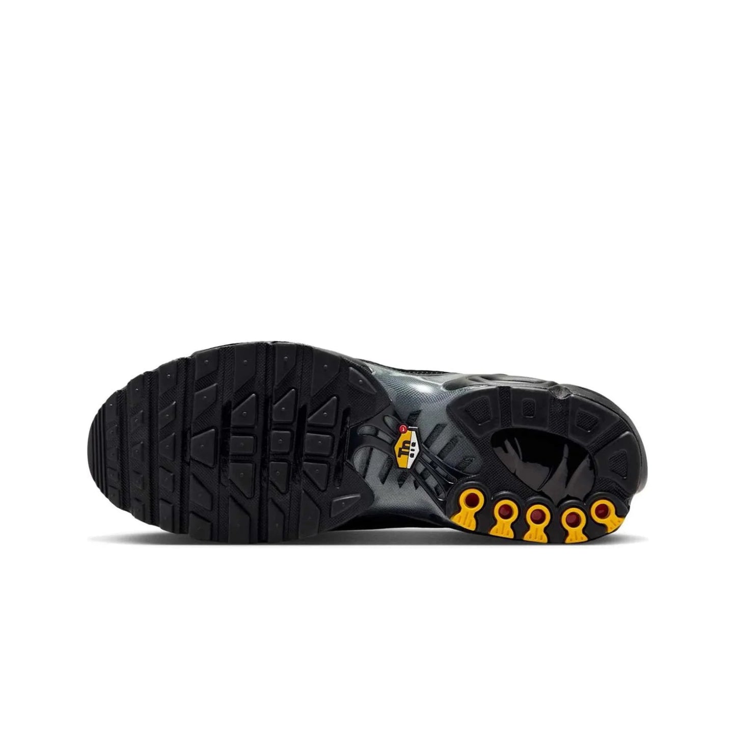 Black boot sole with yellow accents on a white background