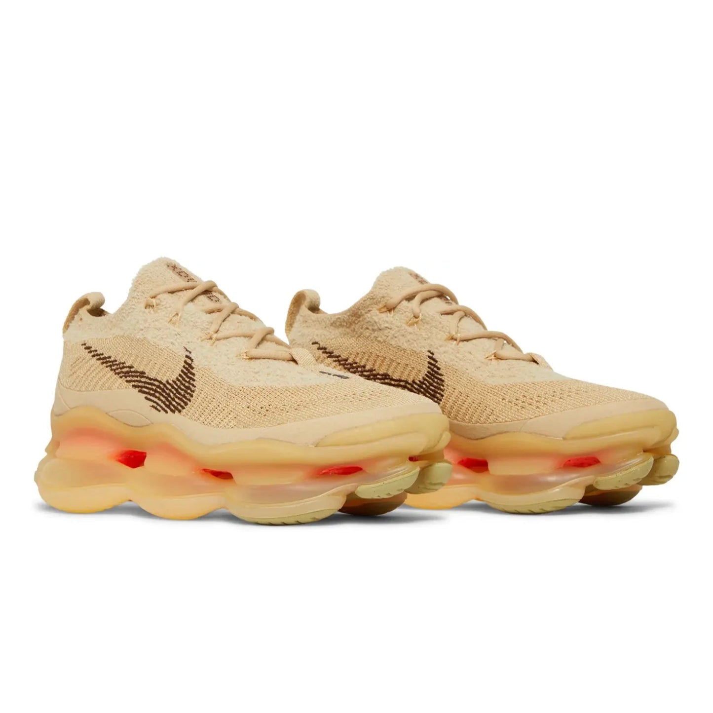 Beige sneakers with a unique sole design on a white background