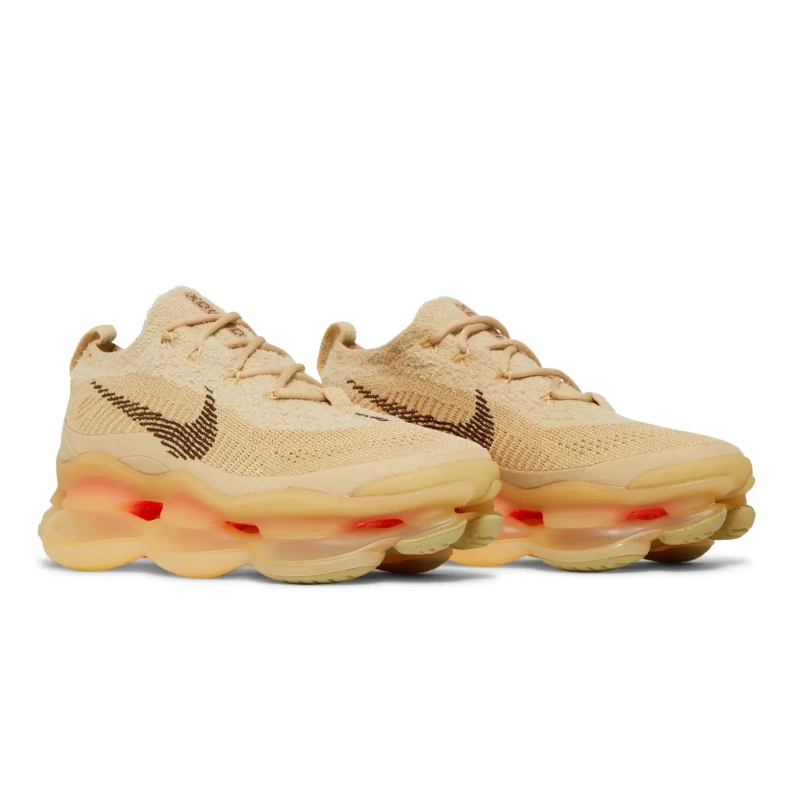 Beige sneakers with a unique sole design on a white background