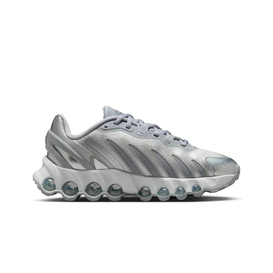 Silver sneaker with unique sole design on a white background