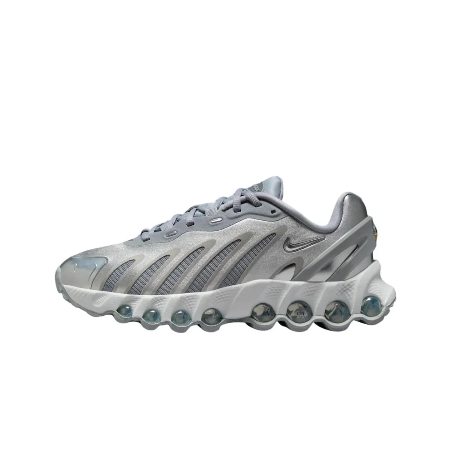 Gray sneaker with unique sole design on a white background