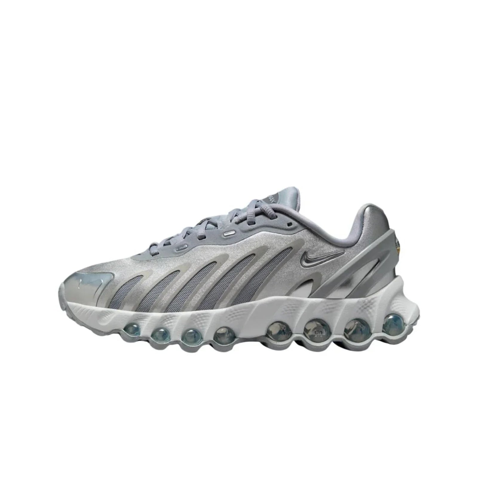 Gray sneaker with unique sole design on a white background