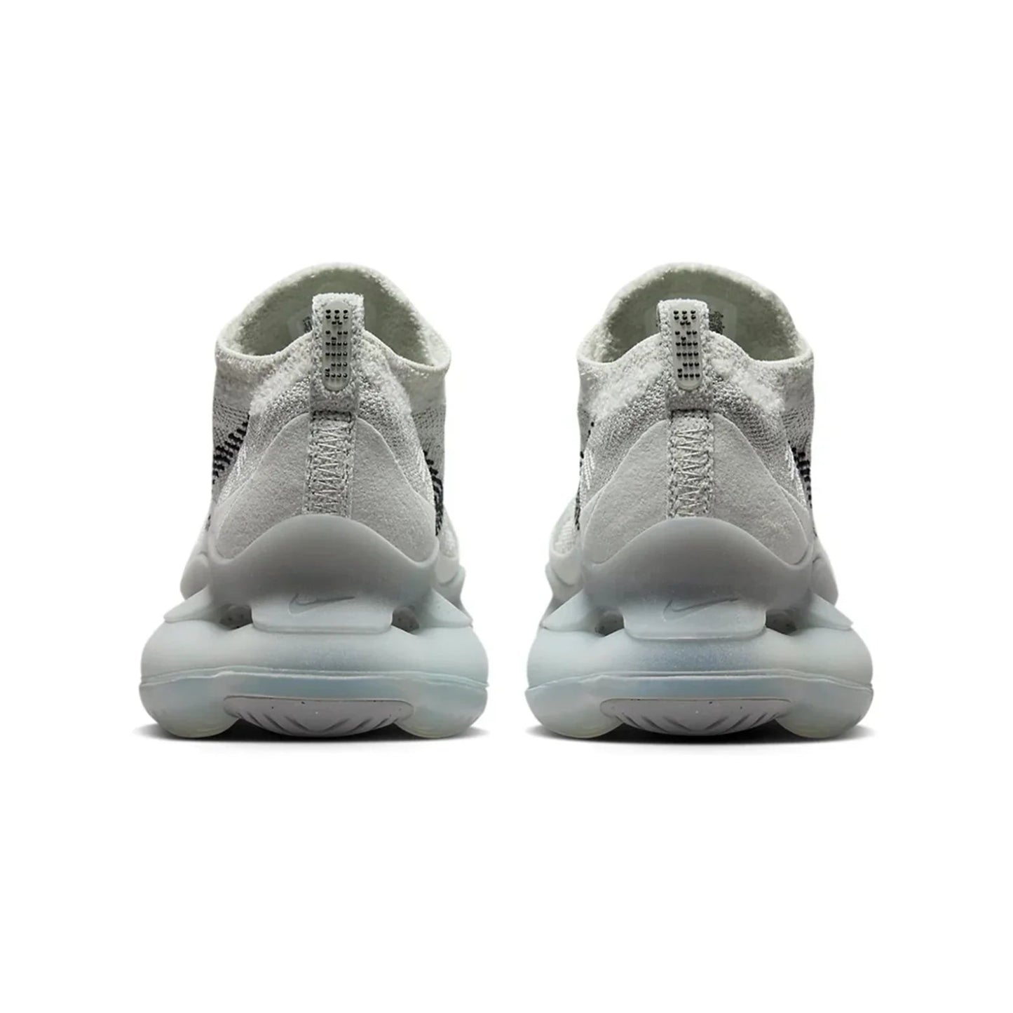 White sneakers with a focus on sole design on a white background