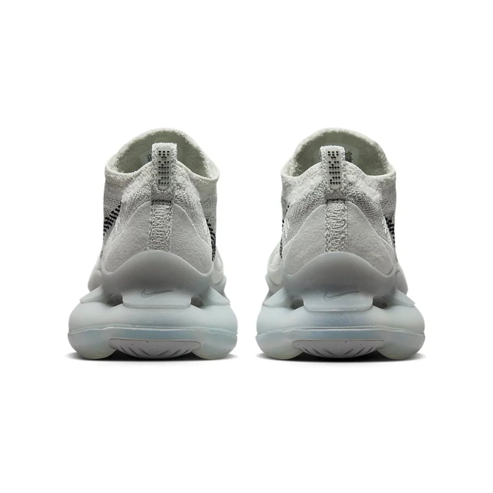 White sneakers with a focus on sole design on a white background