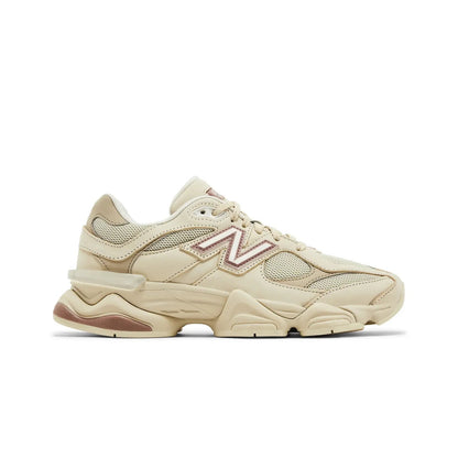 Beige sneaker with New Balance logo on a white background