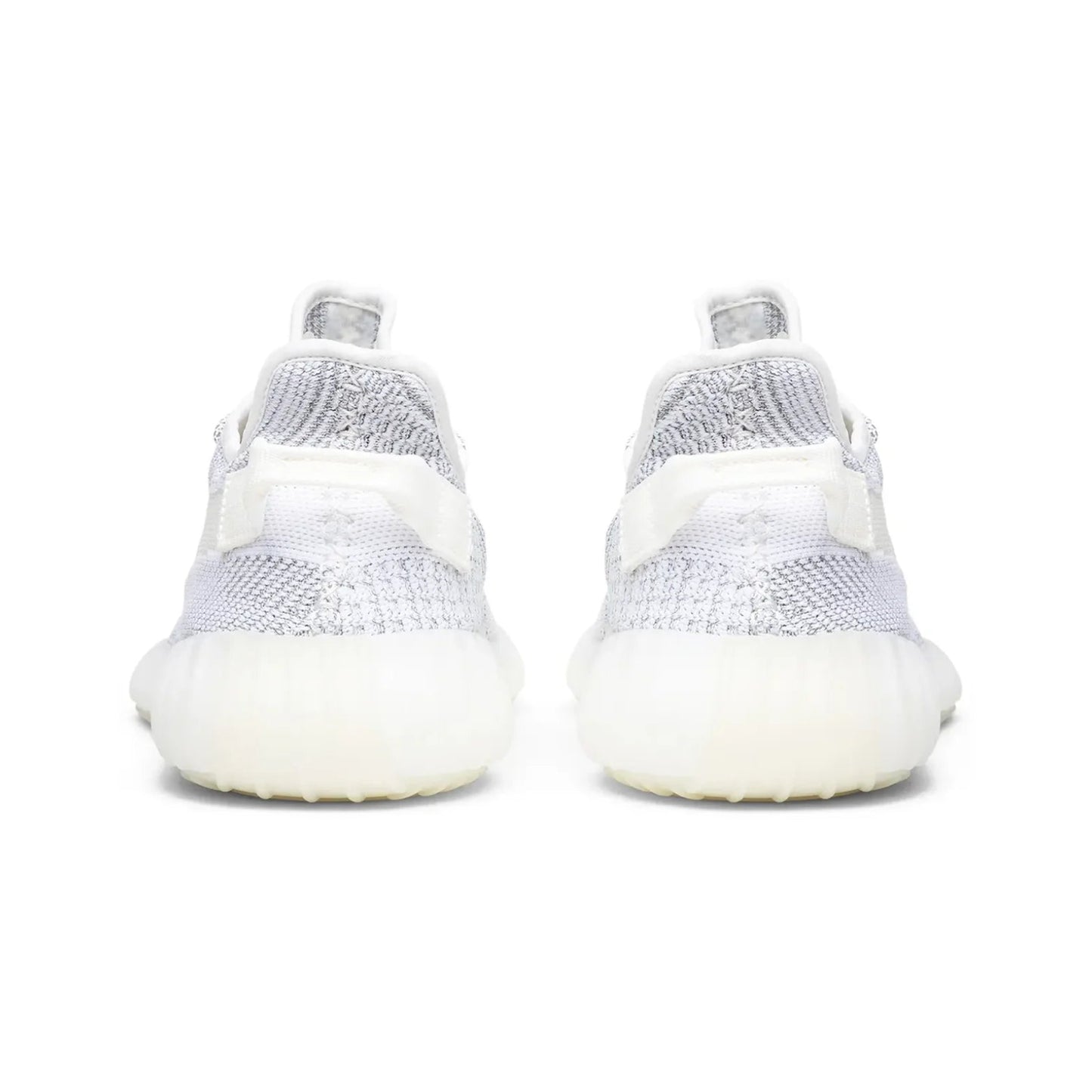 White sneakers with a focus on sole design on a white background
