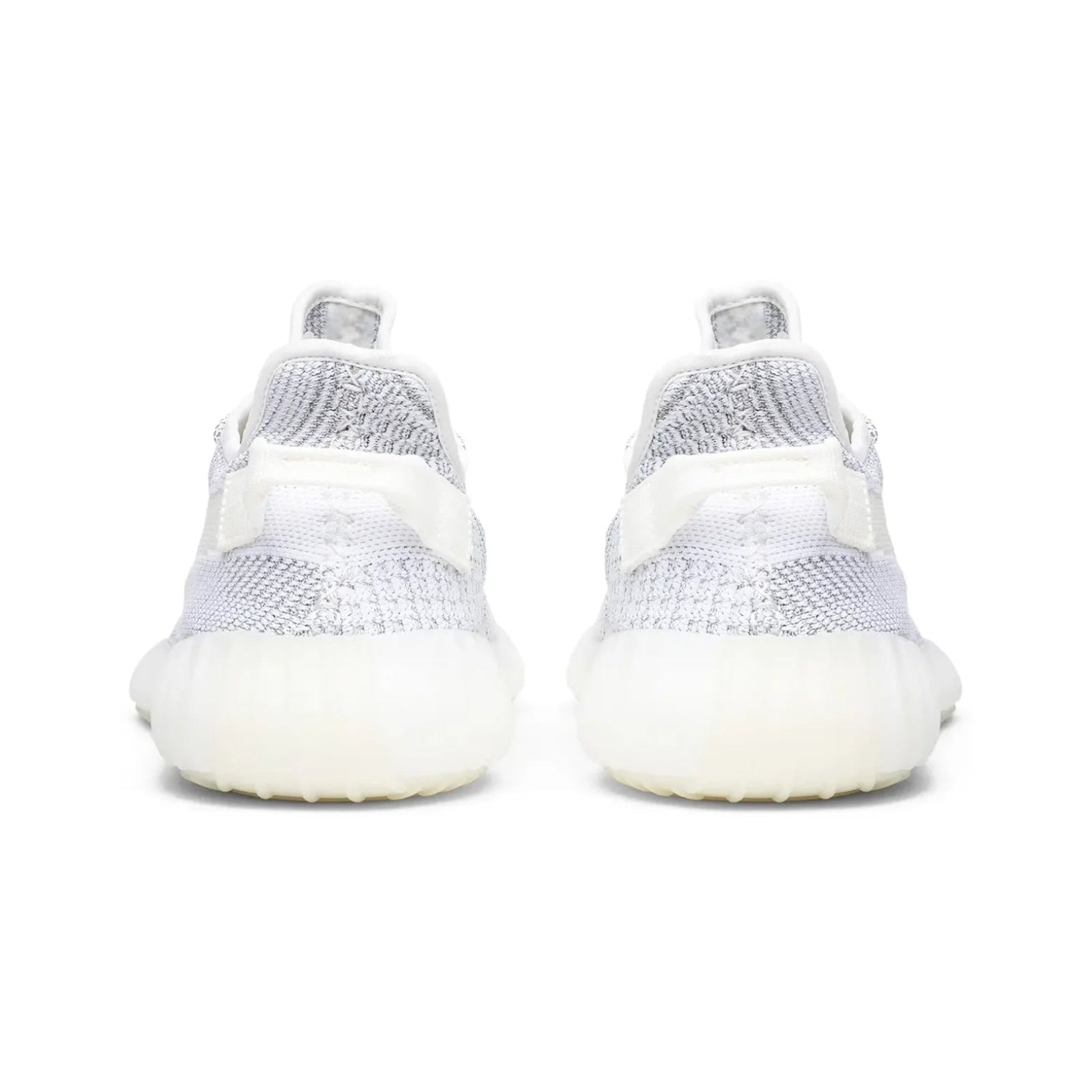 White sneakers with a focus on sole design on a white background