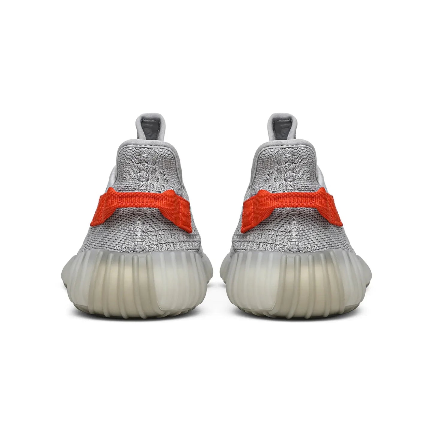 Gray sneakers with orange accents on a white background