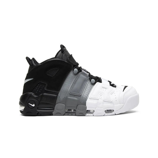 Black, white, and gray sneaker on a white background