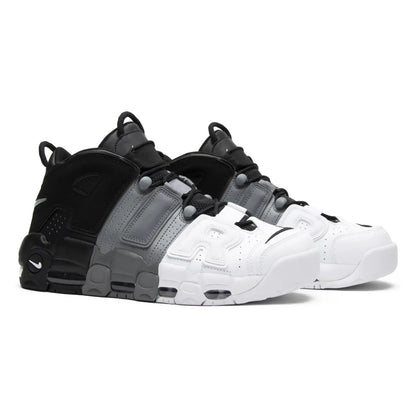 Pair of black, gray, and white sneakers on a white background