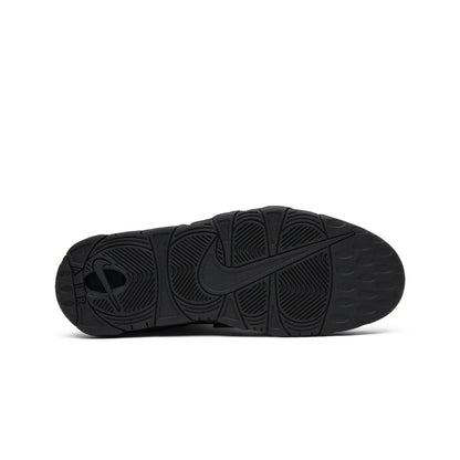 Black Nike sneaker sole on a white background