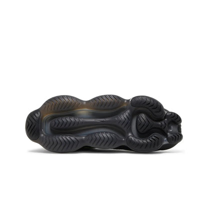 Black textured shoe on a white background