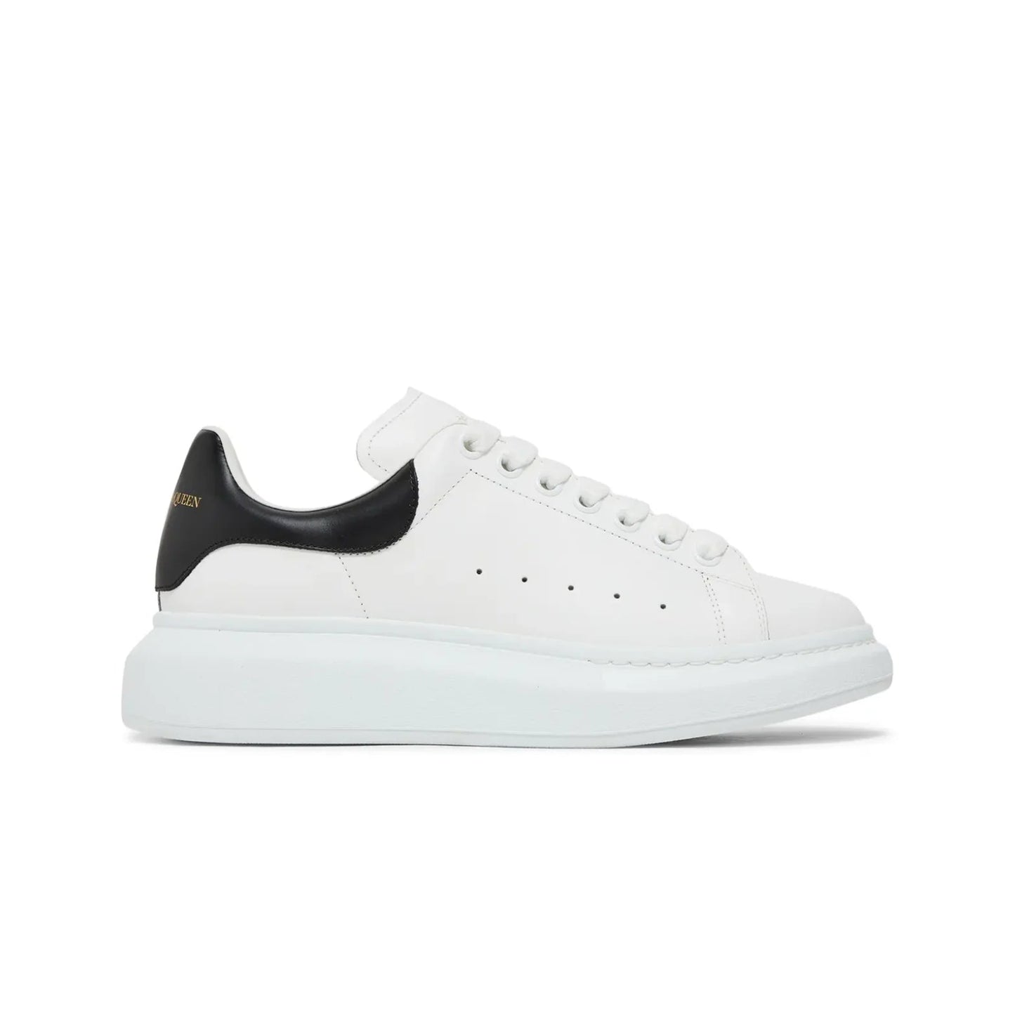 White sneaker with black heel on a white background