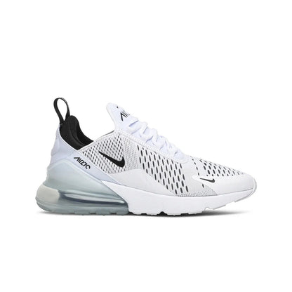 White sneaker with black Nike logo on a white background