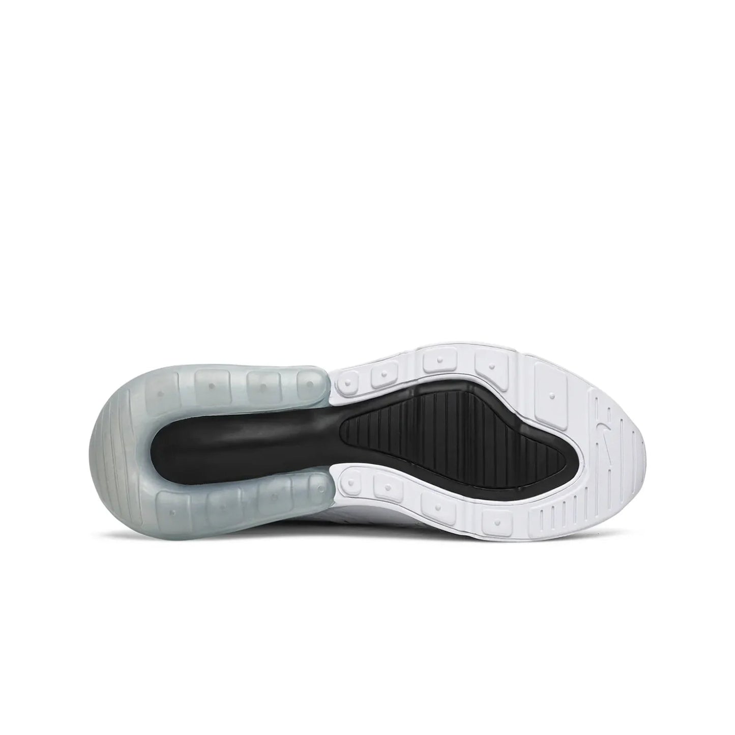 Sole of a white sneaker with black interior on a white background