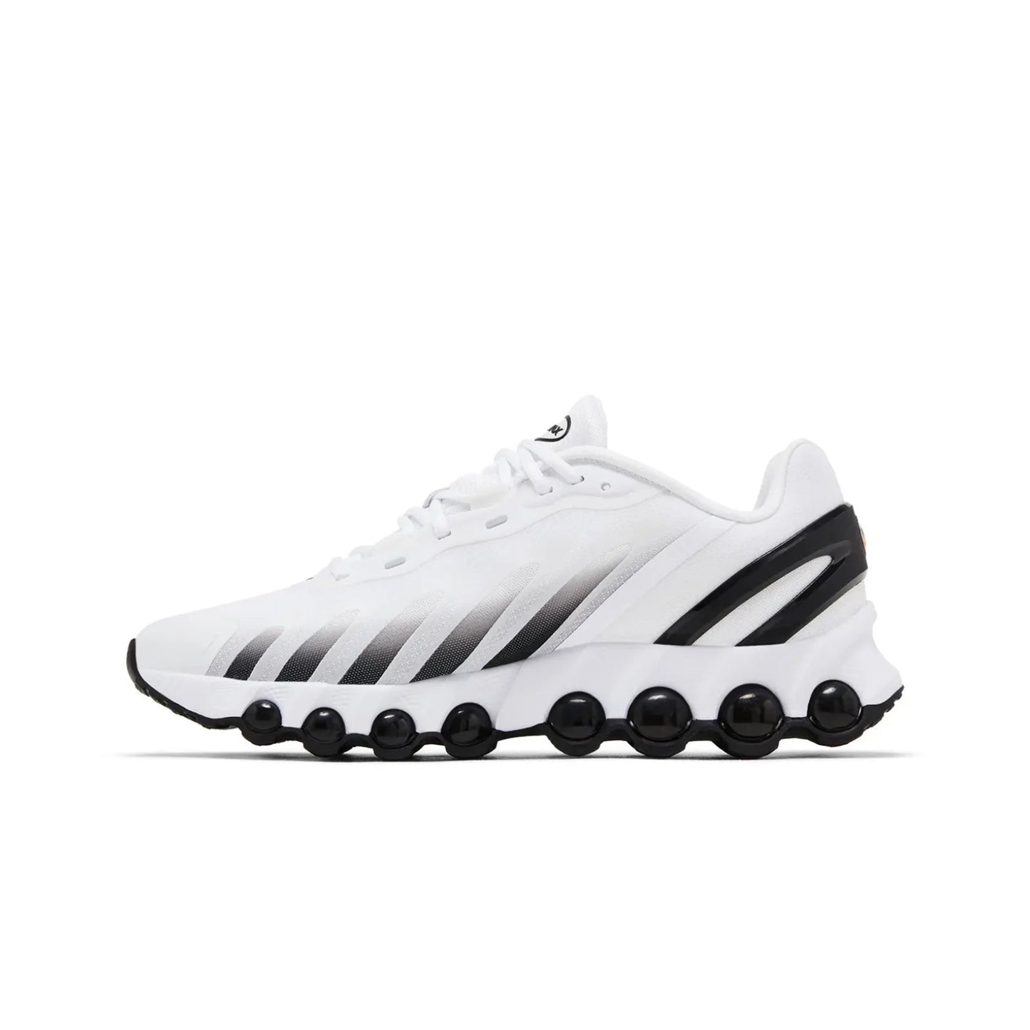 White athletic shoe with black accents on a white background