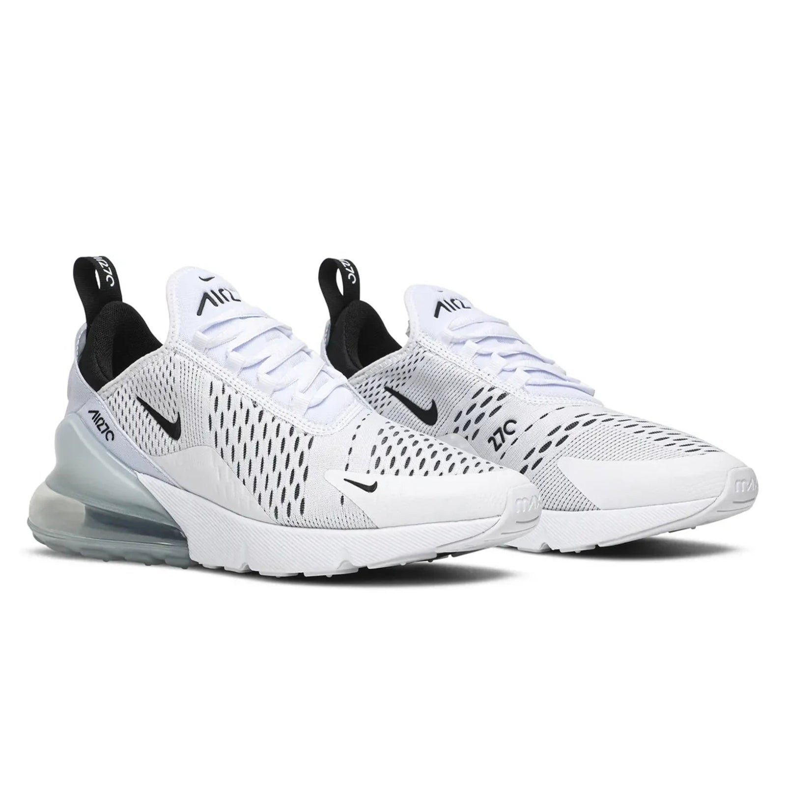 White Nike sneakers with black accents on a white background