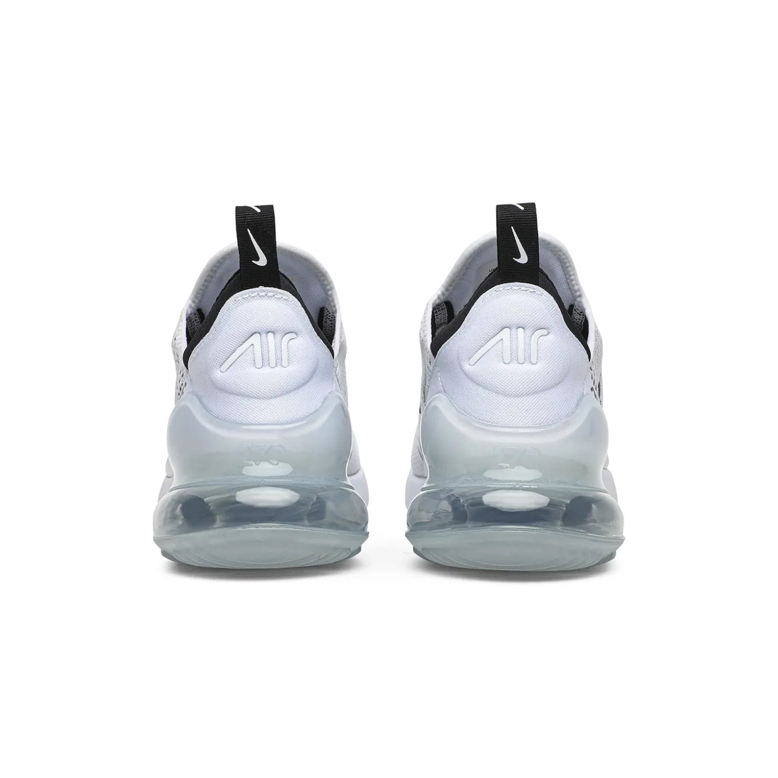 White sneakers with black accents on a white background