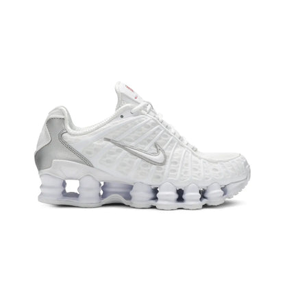 White sneaker with a prominent Nike logo on a white background