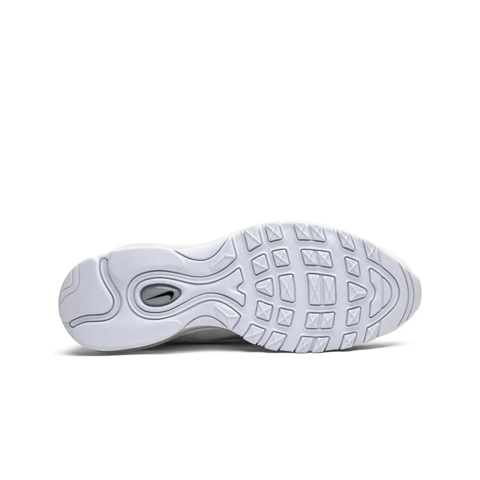White sneaker with a textured sole on a white background