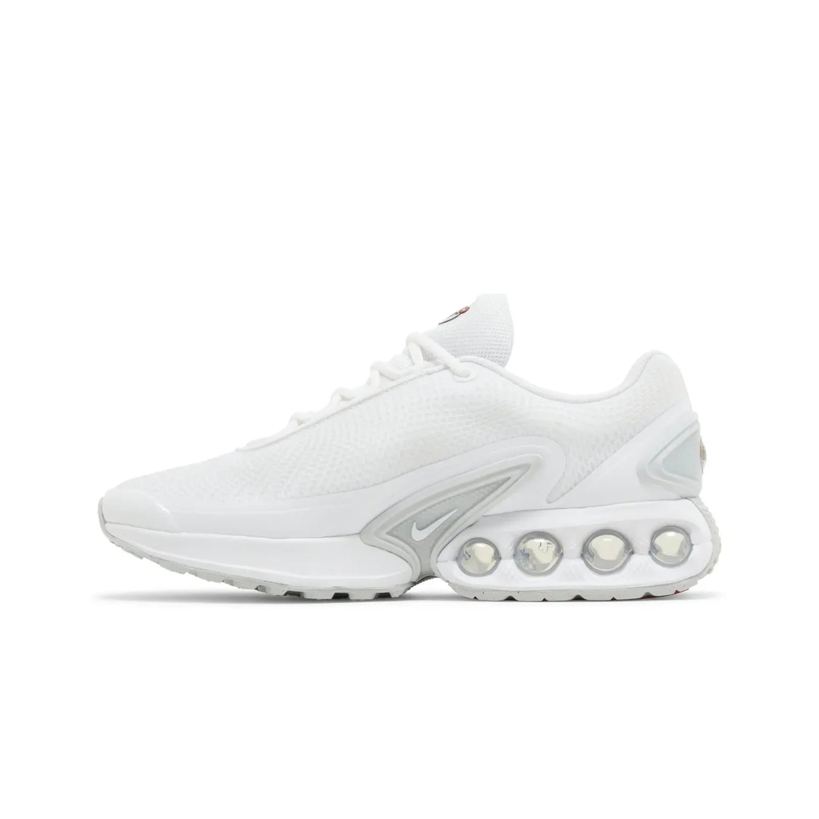 White sneaker with unique sole design on a white background