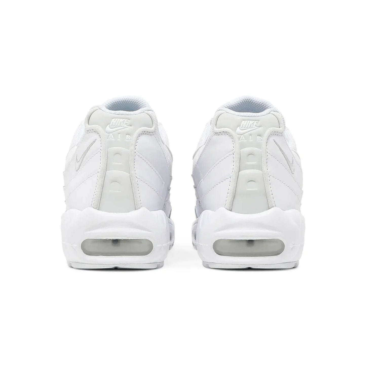 White sneakers with visible Nike logo on a white background