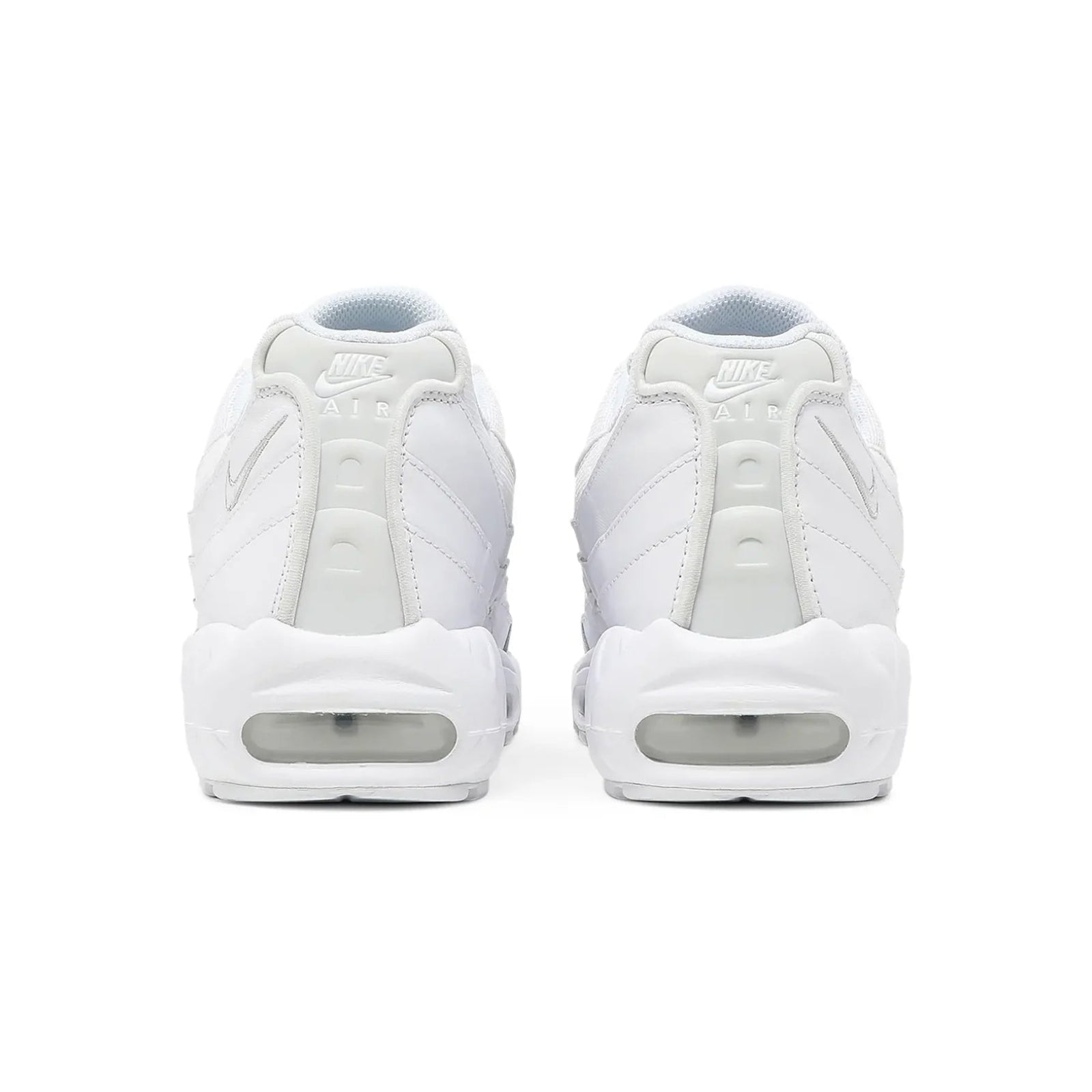 White sneakers with visible Nike logo on a white background