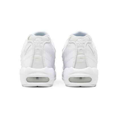 White sneakers with visible Nike logo on a white background