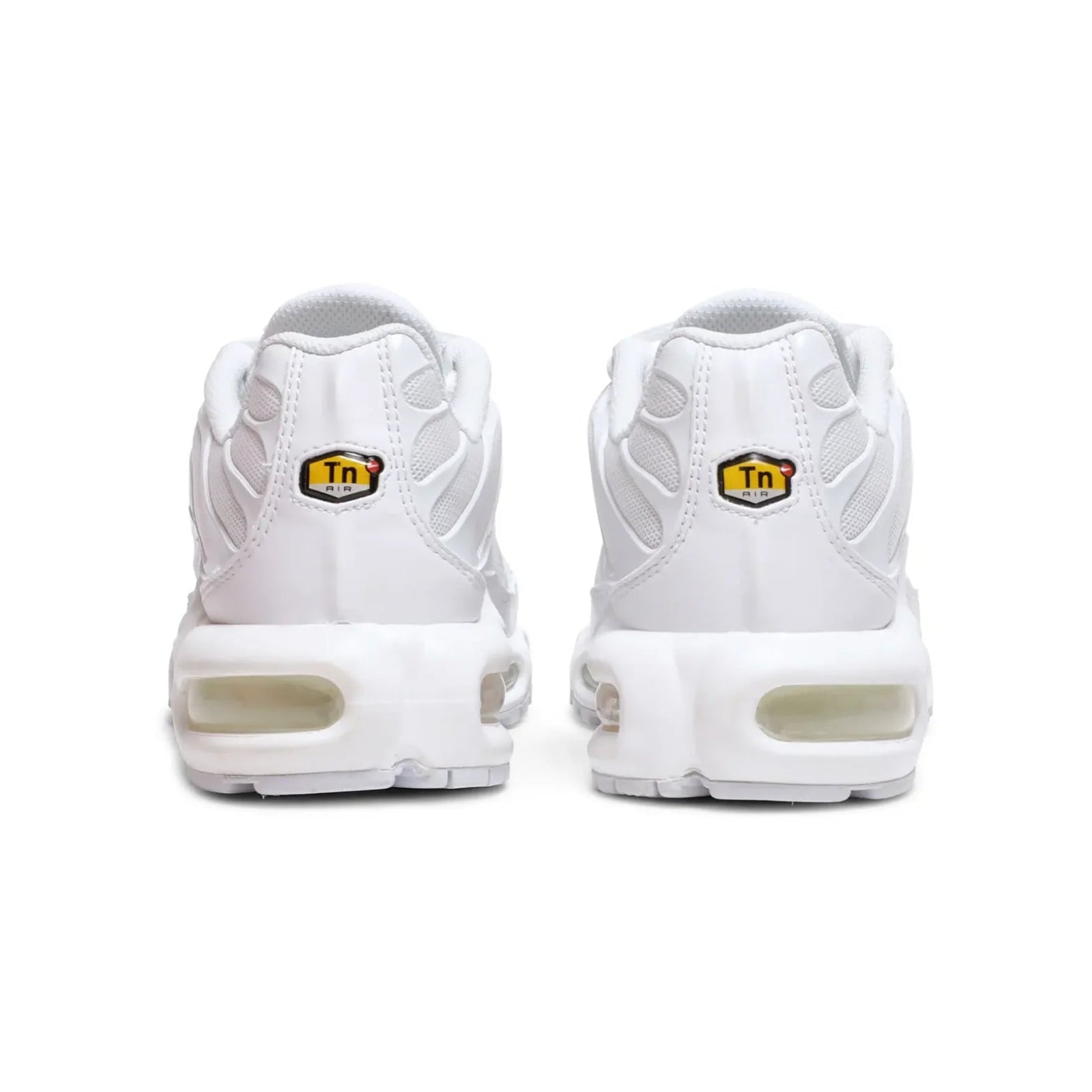 White sneakers with brand logos on a white background