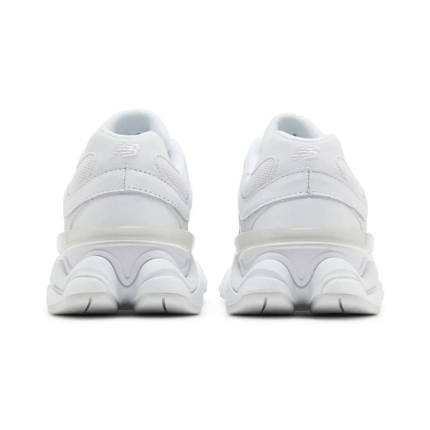 White sneakers shown from the back on a white background