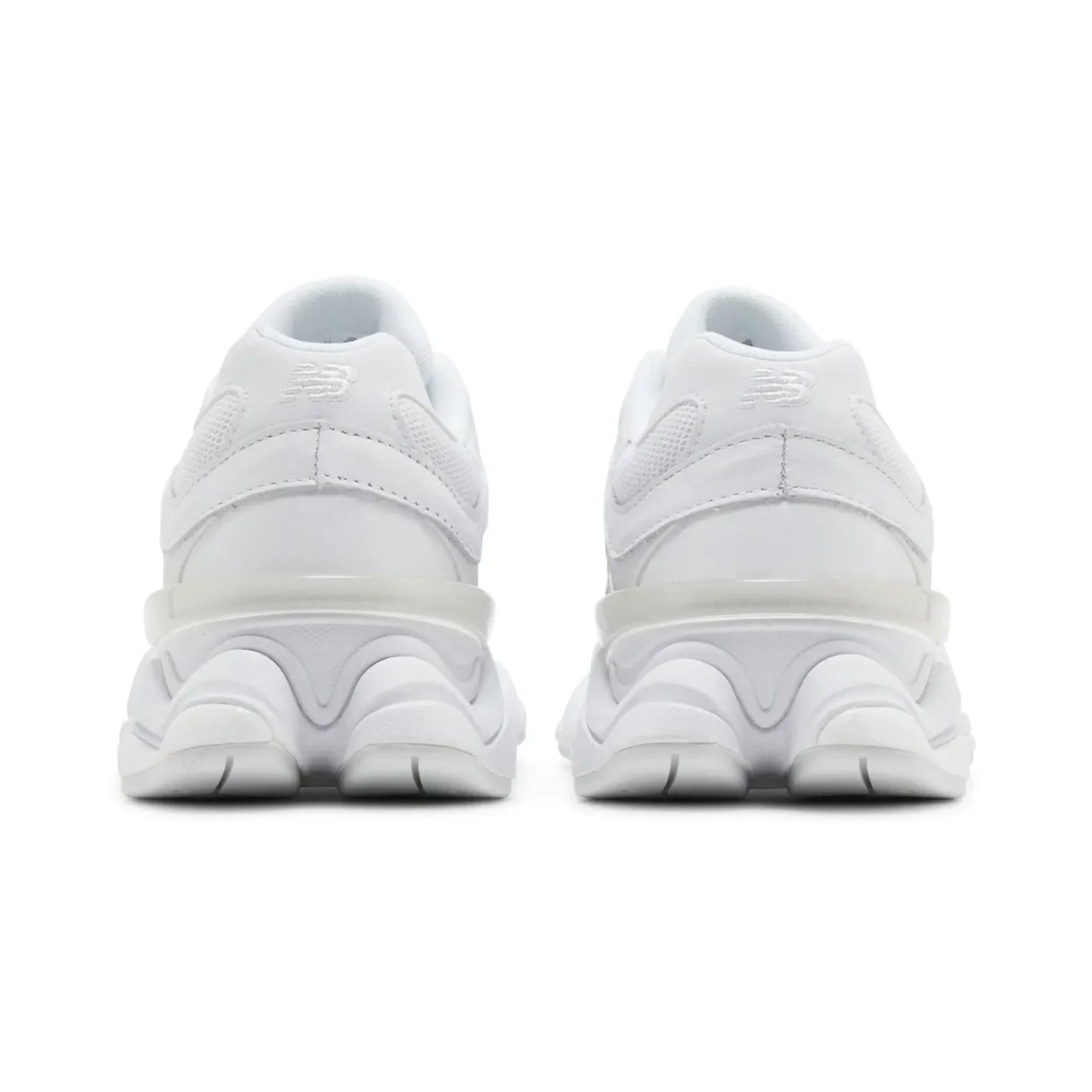 White sneakers shown from the back on a white background