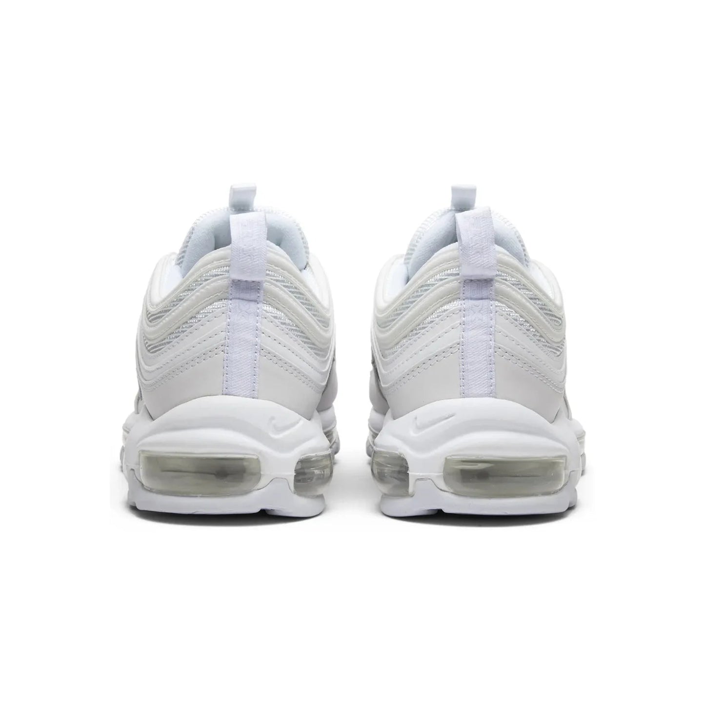 White sneakers with a visible sole design on a white background