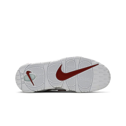 White sneaker with red swoosh logo on a white background