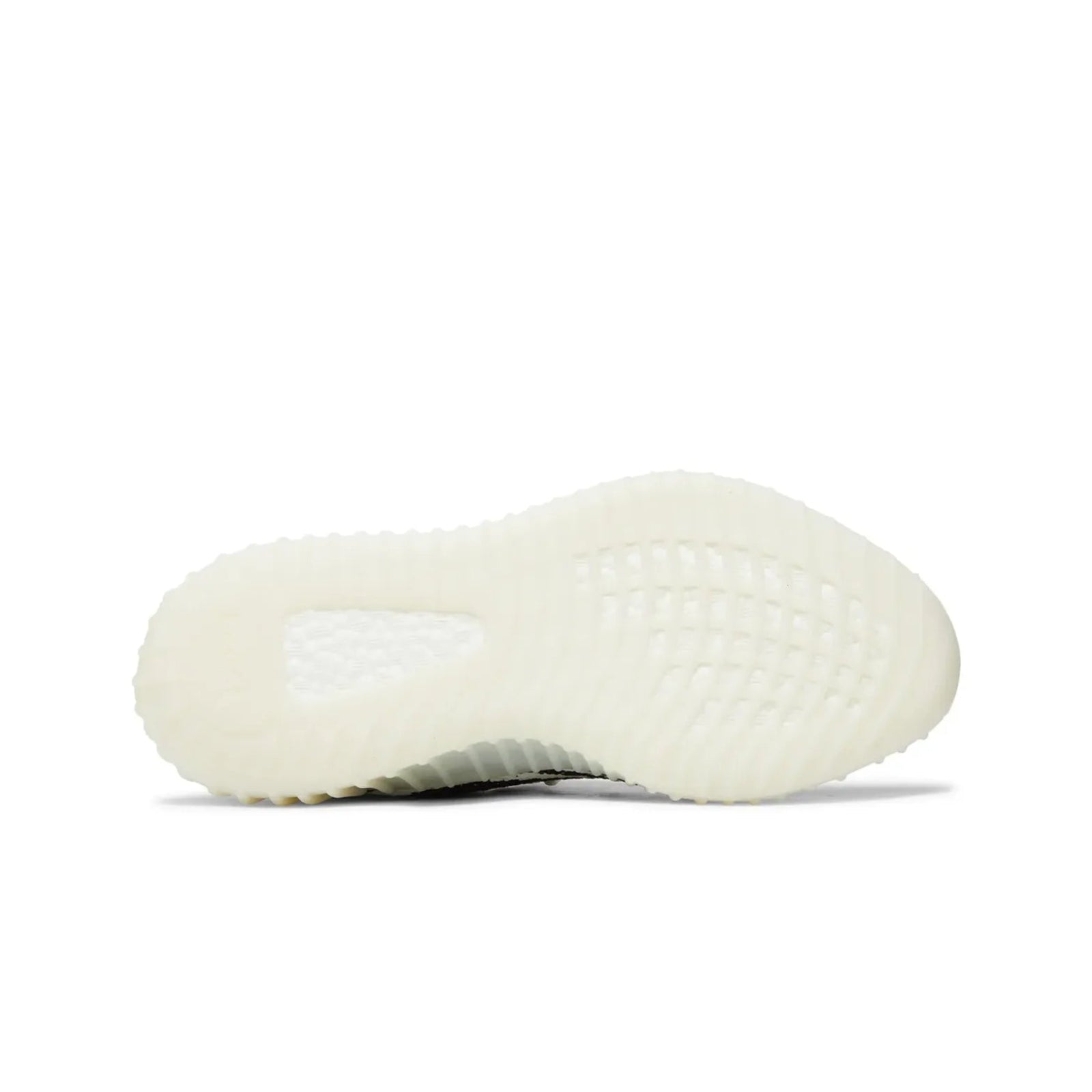 White sneaker sole with a brand logo on a white background